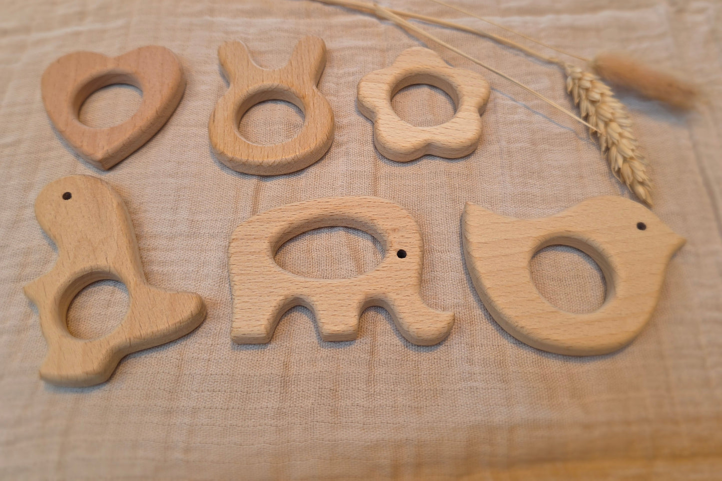 Houten figuren bijtringen