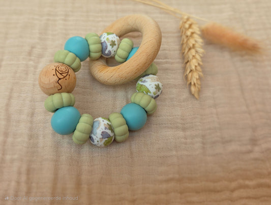 Bijtring met naam dino