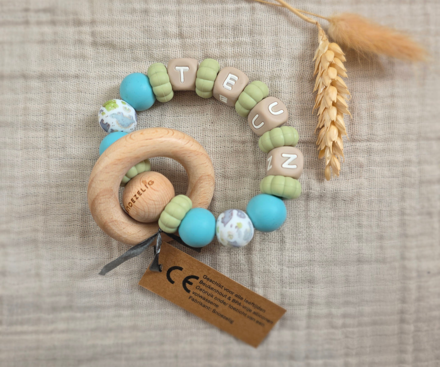 Bijtring met naam siliconen dino Snoezelig