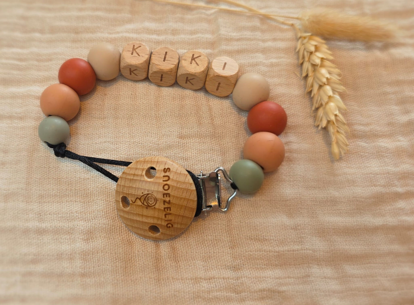 Speenkoord met naam aarde hout Snoezelig