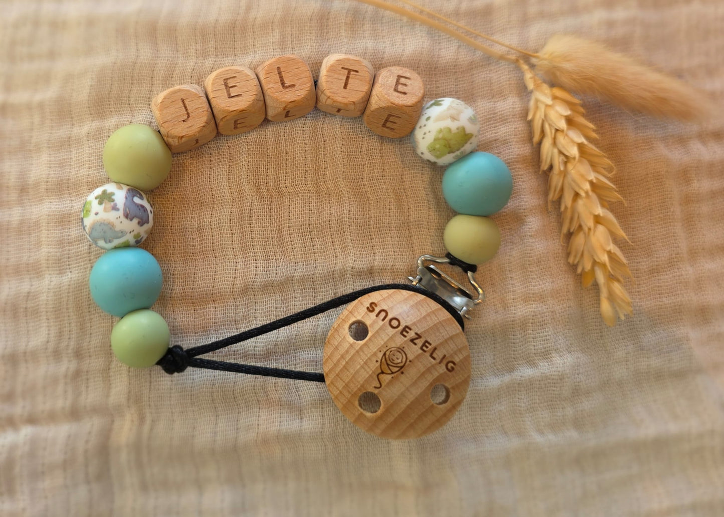 Speenkoord met naam dino hout Snoezelig