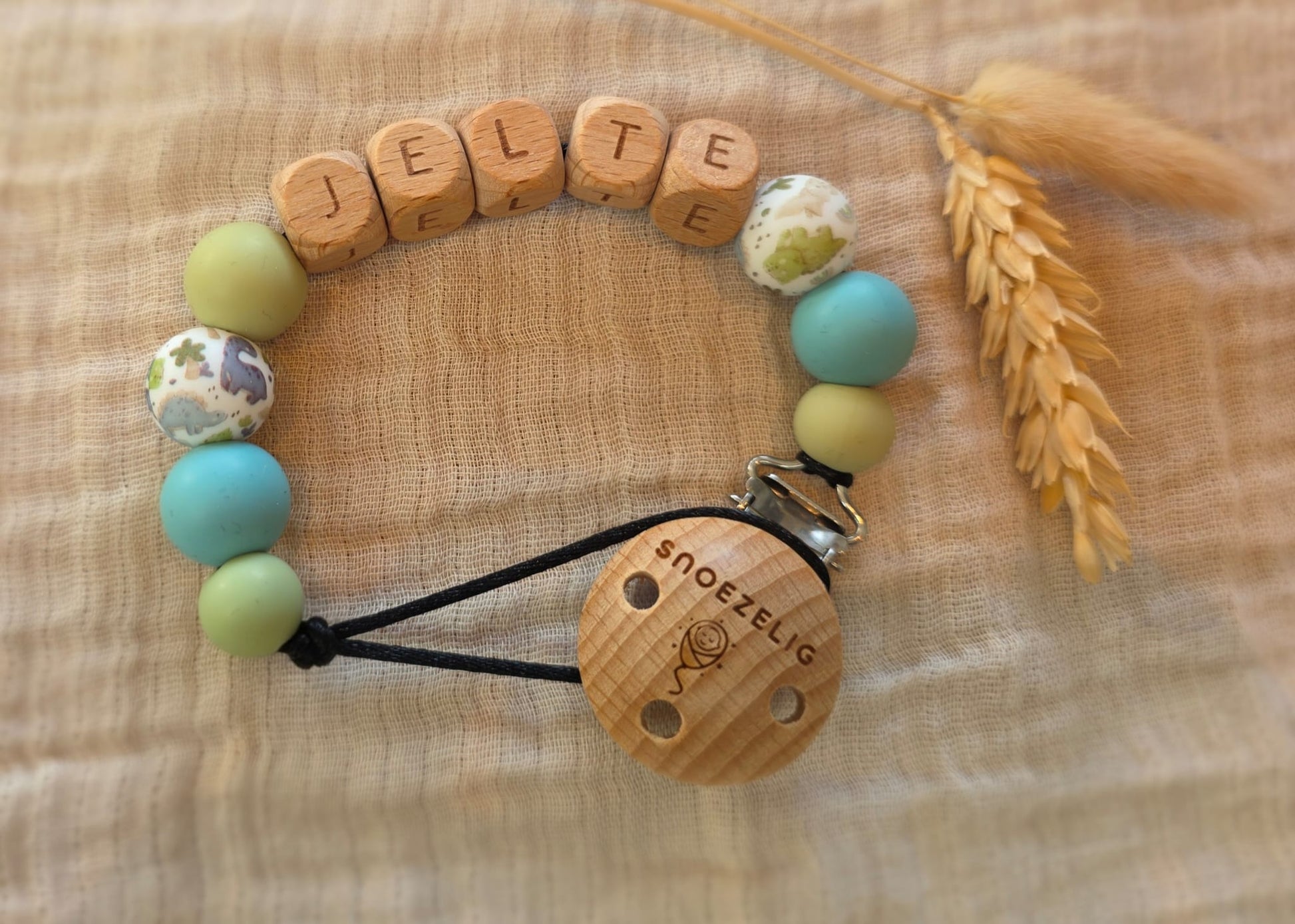 Speenkoord met naam dino hout Snoezelig