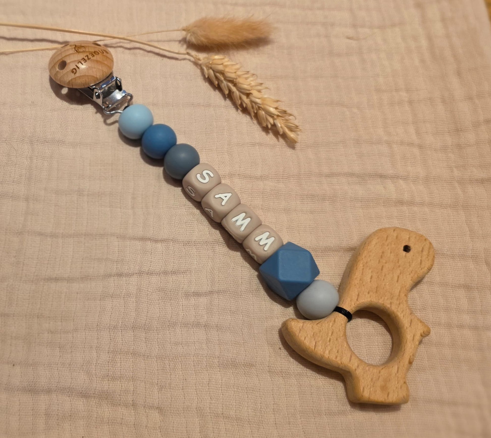 Wagenhanger met naam siliconen dino blauw Snoezelig